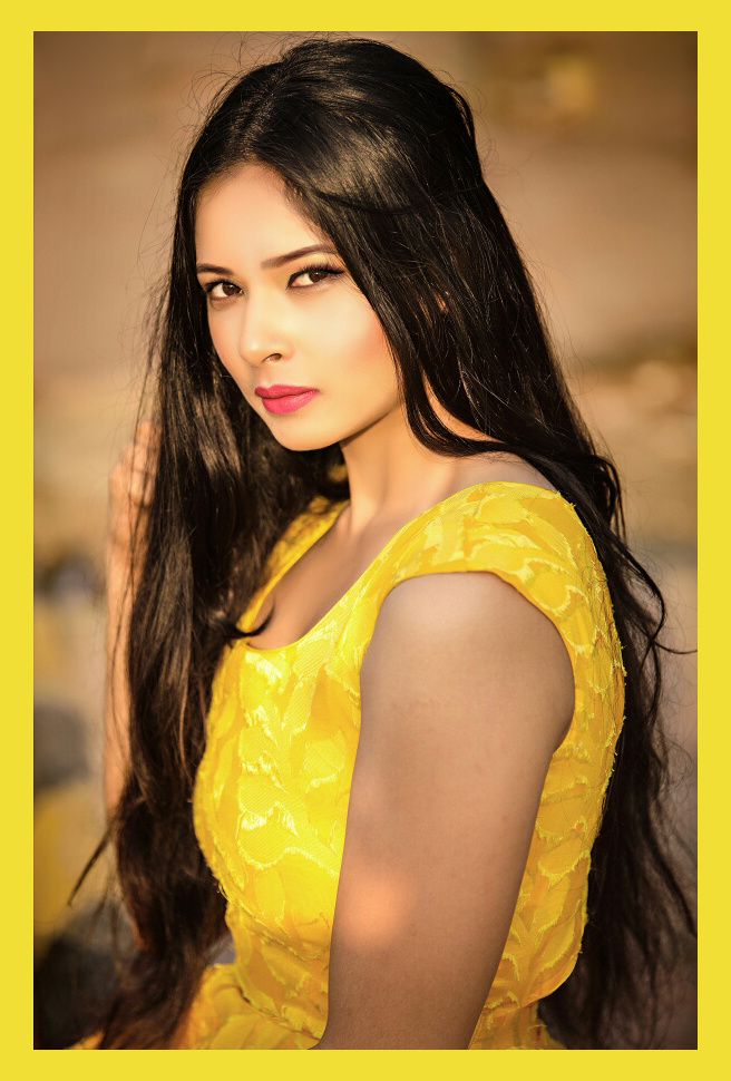Indian model Anisha Sahai wearing a stunning yellow dress