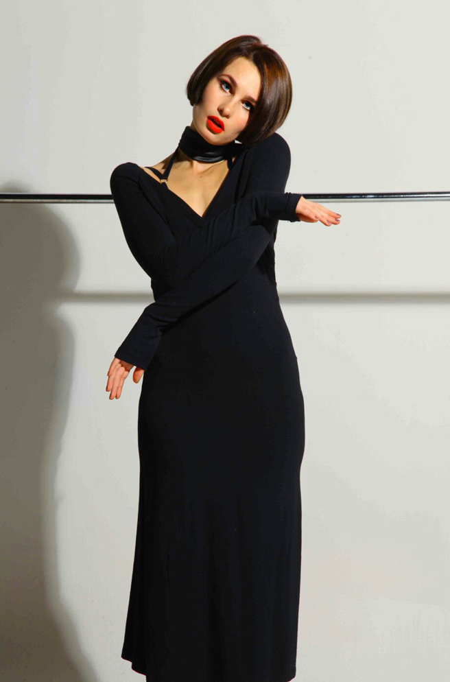 Model Iryana Oborina photoshoot in a stunning black dress