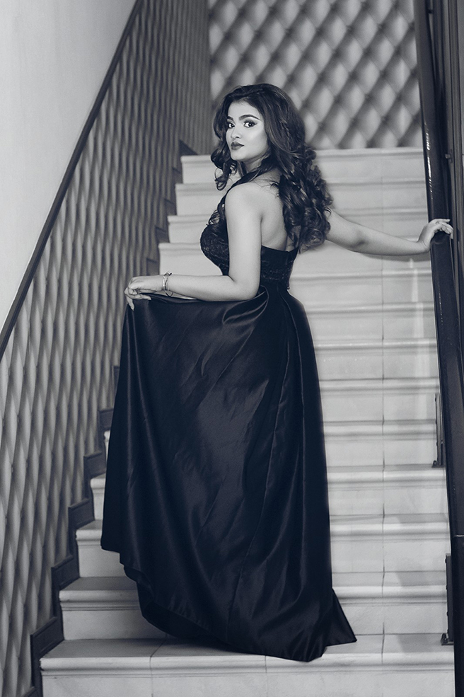 Model Roshni Singh photographed in a black evening gown